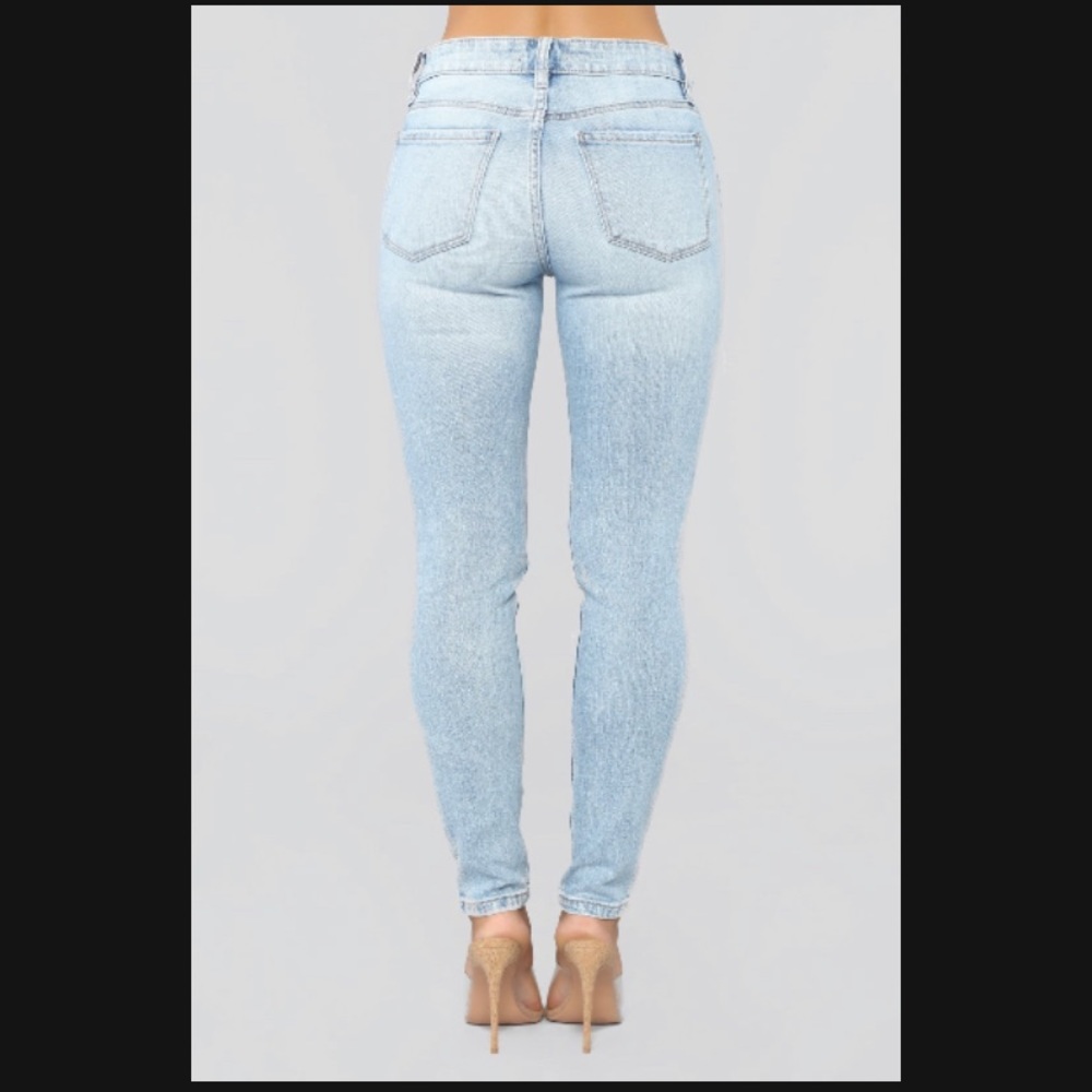 Ripped light wash jeans - Picture 2 of 3